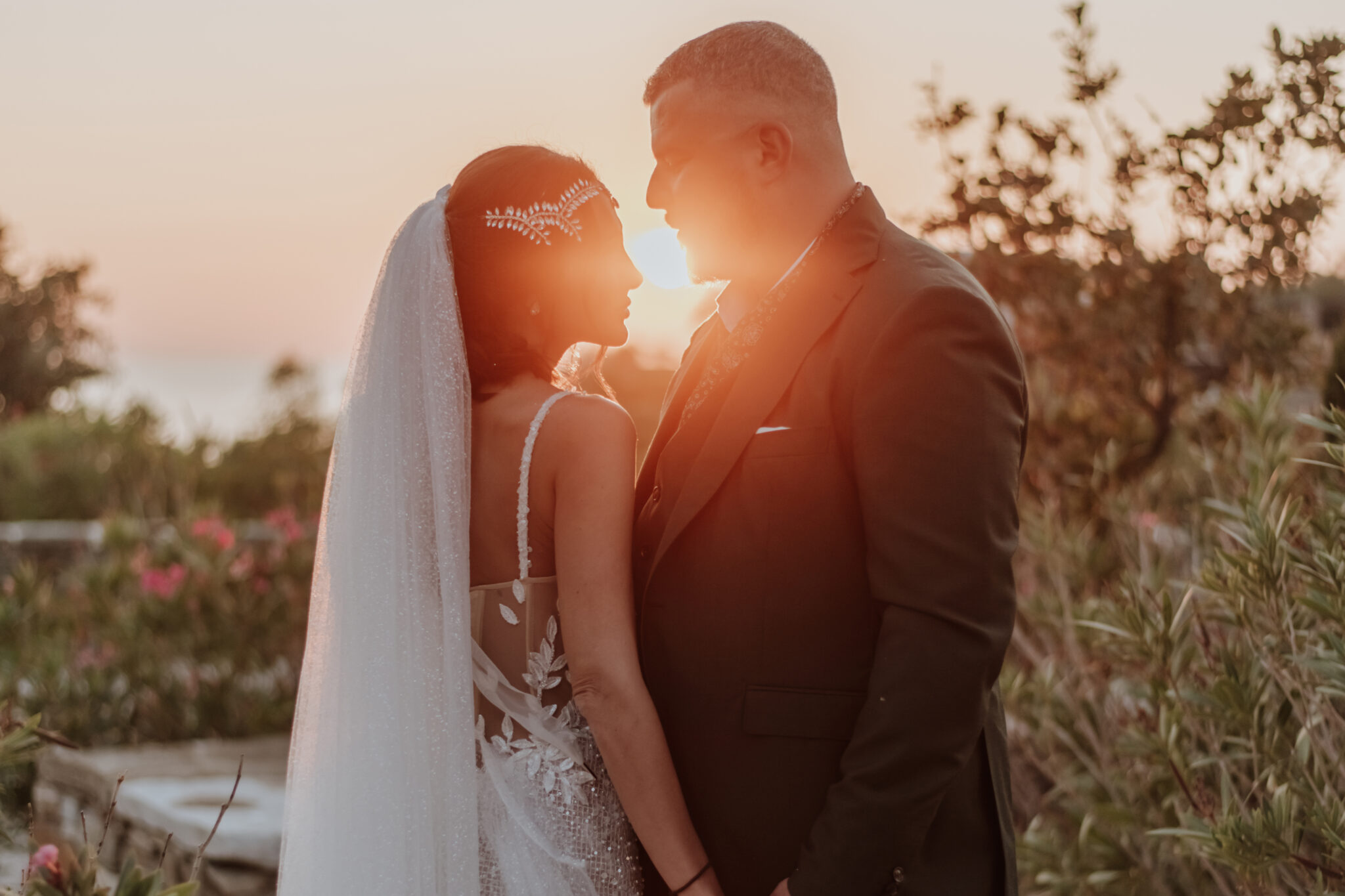 Bride and groom exchanging vows in a scenic Santorini location – destination elopement photography